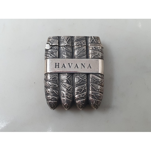 44 - A sterling silver Havana Vesta Case in the form of a cigar case with tobacco leaf decoration, marked... 