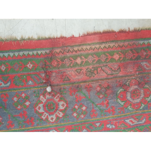 455 - A large Turkish wool Carpet, the multiple borders having stylised floral motifs and with medallion d... 