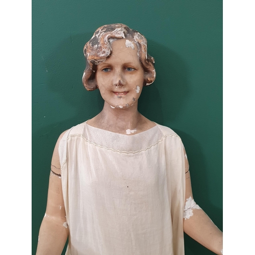 460 - An early 20th Century plaster covered, carved Shop Display Mannikin with removeable arms and painted... 