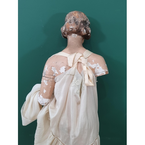 460 - An early 20th Century plaster covered, carved Shop Display Mannikin with removeable arms and painted... 