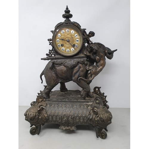 462 - A 19th Century Mantel Clock with drum dial having enamel numerals on gilt metal ground, two train mo... 