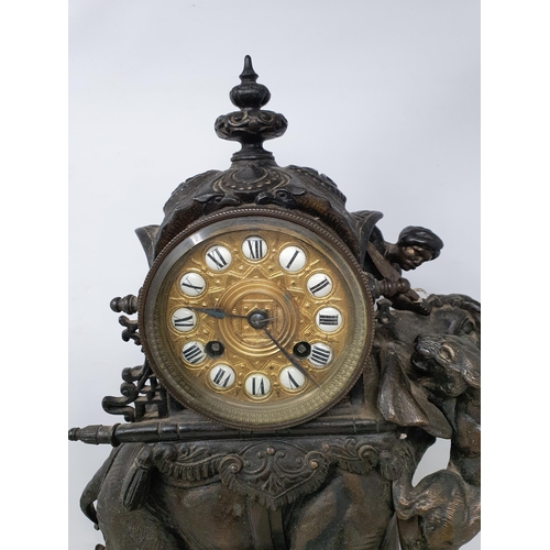 462 - A 19th Century Mantel Clock with drum dial having enamel numerals on gilt metal ground, two train mo... 