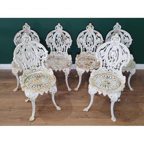 470 - A set of six 19th Century cast iron white painted Garden Chairs with shaped and pierced back, circul... 