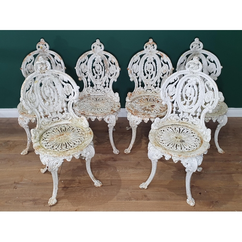 470 - A set of six 19th Century cast iron white painted Garden Chairs with shaped and pierced back, circul... 