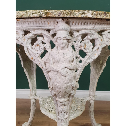 471 - A cast iron white painted circular Garden Table with pierced top, figural supports and paw supports,... 