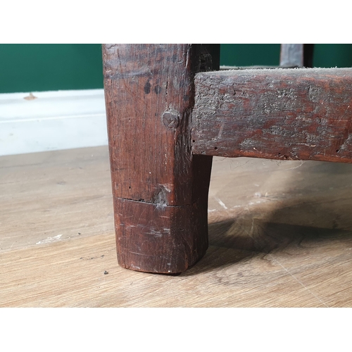 478 - An 18th Century Welsh oak Elbow Chair with vase splat back on square supports 3ft 6in H x 1ft 11in W