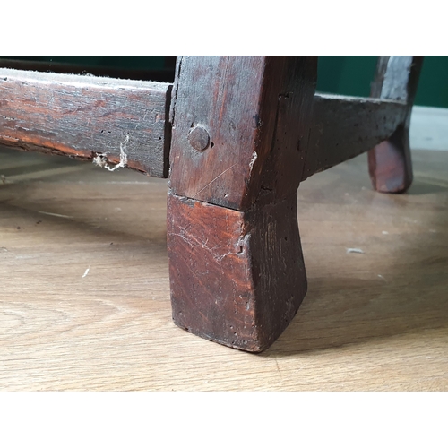 478 - An 18th Century Welsh oak Elbow Chair with vase splat back on square supports 3ft 6in H x 1ft 11in W