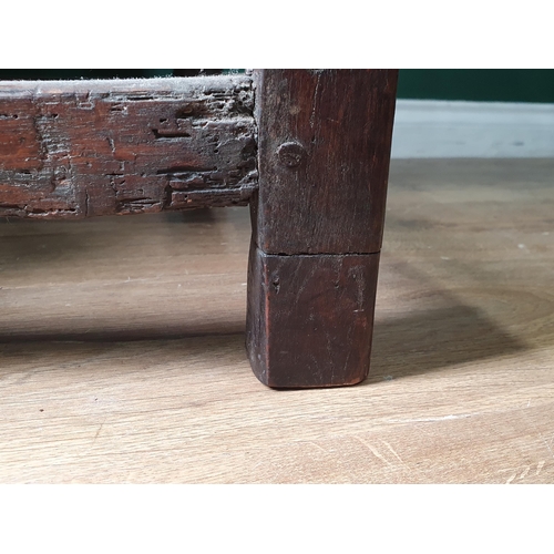 478 - An 18th Century Welsh oak Elbow Chair with vase splat back on square supports 3ft 6in H x 1ft 11in W