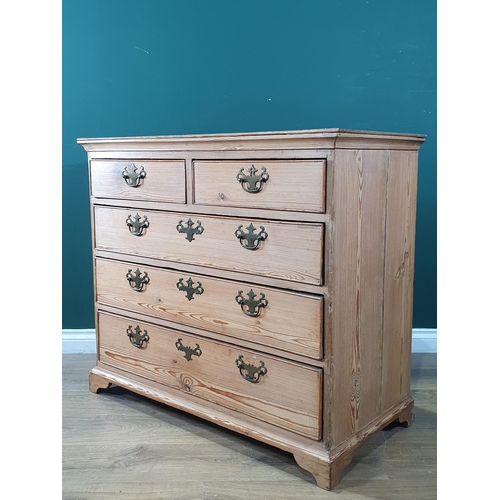 481 - A Georgian pine Chest of two short and three graduated long drawers mounted on ogee bracket feet 3ft... 