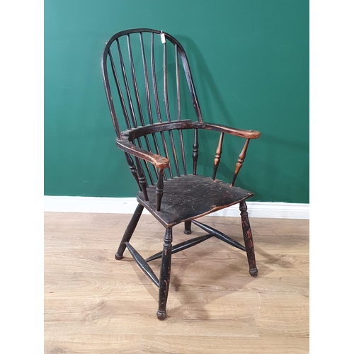 493 - A 19th Century ash stick back Elbow Chair with early black paint remnants on turned supports united ... 