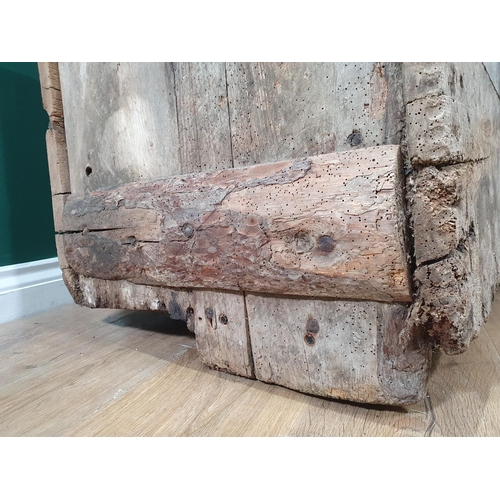 496 - An early oak and elm boarded Church Chest, with iron strap hinges, A/F. 2ft 3