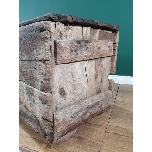 496 - An early oak and elm boarded Church Chest, with iron strap hinges, A/F. 2ft 3