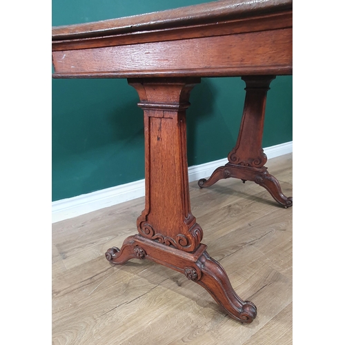 513 - A 19th Century Oak Desk in the manner of Holland & Sons, the moulded top having inset writing surfac... 