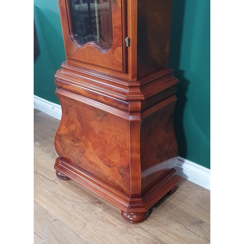 514 - A reproduction walnut Longcase Clock with arched moon phase brass dial, 8 day movement with quarter ... 