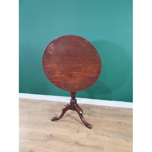 517 - A Georgian mahogany Tripod Table with baluster column 2ft 4in dia.