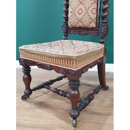 518 - A 19th Century rosewood Hall Chair with needlepoint upholstered back and seat with spiral back suppo... 