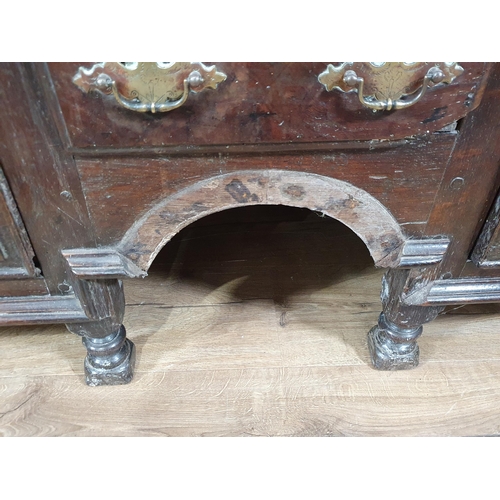 519 - An 18th Century oak Chest on Stand with an usual arrangement of four short drawers and a cupboard wi... 