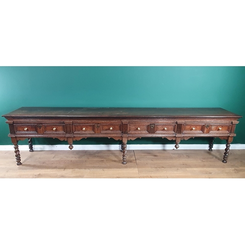 521 - A large and impressive 17th Century oak Dresser Base with moulded top, above four recessed moulded d... 