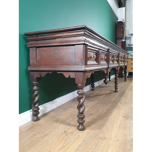 521 - A large and impressive 17th Century oak Dresser Base with moulded top, above four recessed moulded d... 