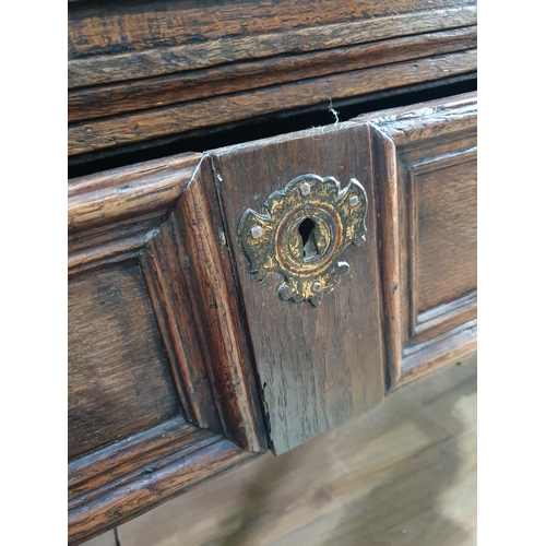 521 - A large and impressive 17th Century oak Dresser Base with moulded top, above four recessed moulded d... 