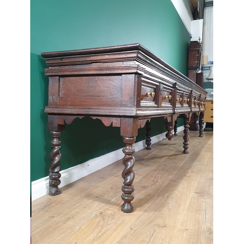 521 - A large and impressive 17th Century oak Dresser Base with moulded top, above four recessed moulded d... 