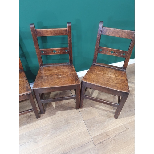 530 - A matched set of six antique oak Chairs with solid seats on squared supports and stretchers