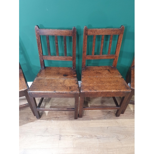 530 - A matched set of six antique oak Chairs with solid seats on squared supports and stretchers