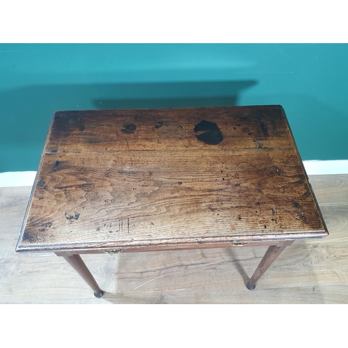 552 - An antique oak Side Table with moulded top, fitted frieze drawer, on turned tapering supports, 2ft 7... 