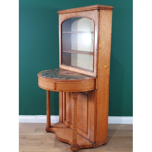 559 - A 19th Century maple demi-lune Side Cabinet, the top with glazed sliding door enclosing fitted shelv... 