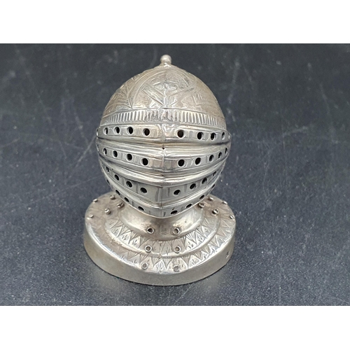 56 - A Victorian silver Pepperette in the form of a closed helmet on circular base, Birmingham 1898, make... 