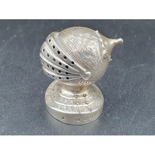 56 - A Victorian silver Pepperette in the form of a closed helmet on circular base, Birmingham 1898, make... 