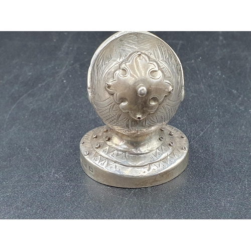 56 - A Victorian silver Pepperette in the form of a closed helmet on circular base, Birmingham 1898, make... 