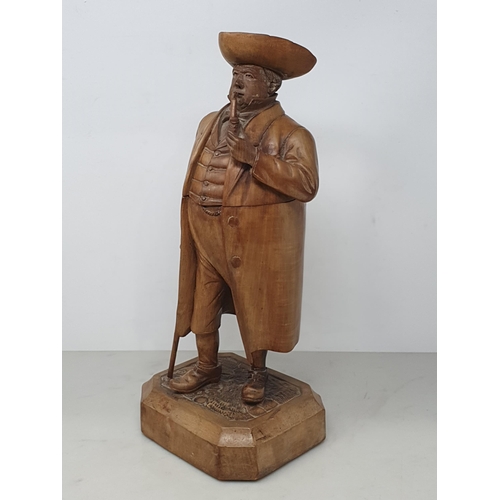 564 - A Treen Tobacco Jar in the form of a Gentleman smoking a Pipe, with Walking Stick, wearing Tricorn H... 