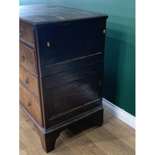 583 - An 18th Century walnut and oak Chest of two short and three long graduated drawers on bracket suppor... 