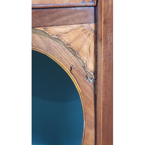 586 - A Georgian mahogany serpentine Sideboard, crossbanded in satinwood, fitted frieze drawer, a double d... 