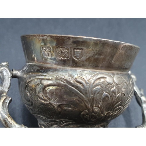 59 - A George V silver Wager Cup with floral and leafage scroll decoration,inscribed Grocers Hall 1910, L... 