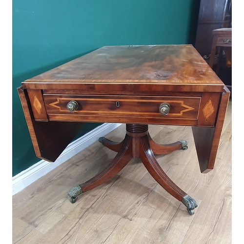 594 - A 19th Century mahogany and satinwood crossbanded Pembroke Table fitted two frieze drawers, raised o... 