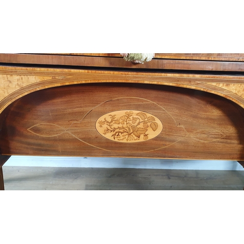 595 - A George III mahogany Breakfront Sideboard, crossbanded in satinwood fitted central drawer above a s... 