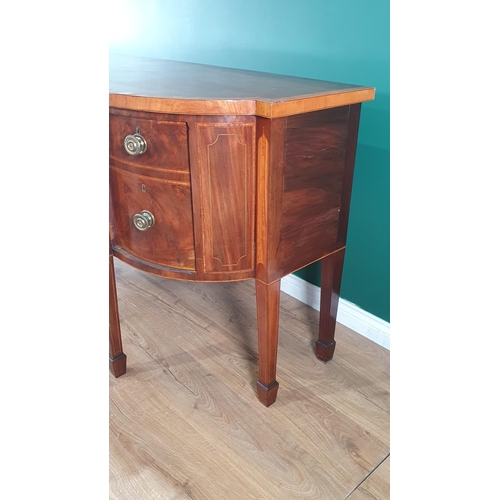 595 - A George III mahogany Breakfront Sideboard, crossbanded in satinwood fitted central drawer above a s... 