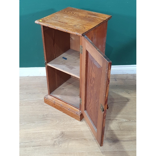 599 - An antique pitch pine Pot Cupboard with simulated bamboo moulding and single cupboard door on plinth... 