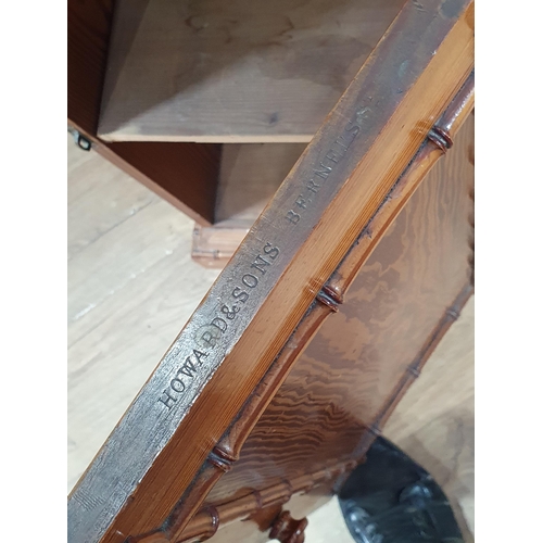 599 - An antique pitch pine Pot Cupboard with simulated bamboo moulding and single cupboard door on plinth... 