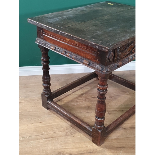 602 - A 17th Century and later oak Side Table with cleated two plank top above single drawer carved with s... 