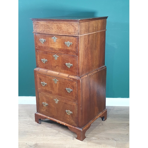 608 - A late 19th Century walnut Chest with crossbanded top and fitted four crossbanded drawers on bracket... 