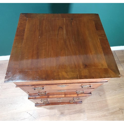 608 - A late 19th Century walnut Chest with crossbanded top and fitted four crossbanded drawers on bracket... 