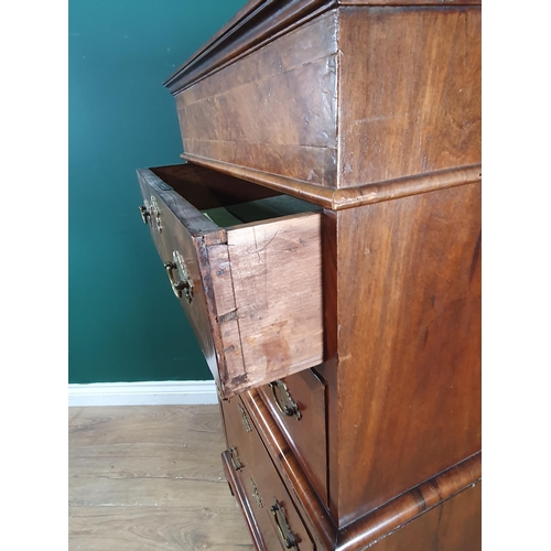 608 - A late 19th Century walnut Chest with crossbanded top and fitted four crossbanded drawers on bracket... 