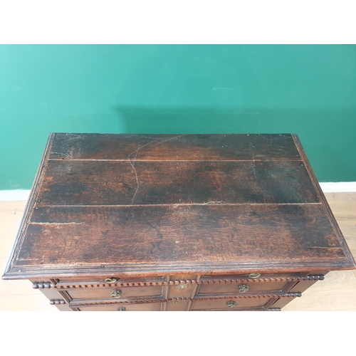 618 - A 17th Century oak Chest of four long drawers with moulded and beaded design on squared supports, 3f... 