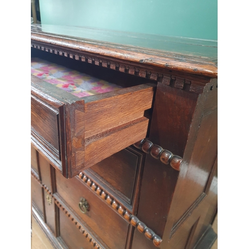 618 - A 17th Century oak Chest of four long drawers with moulded and beaded design on squared supports, 3f... 