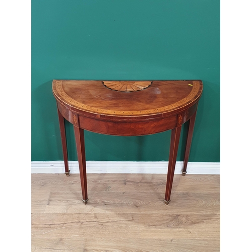 621 - A 19th Century satinwood demi-lune fold-over Card Table with fan inlay and foliated detailed crossba... 