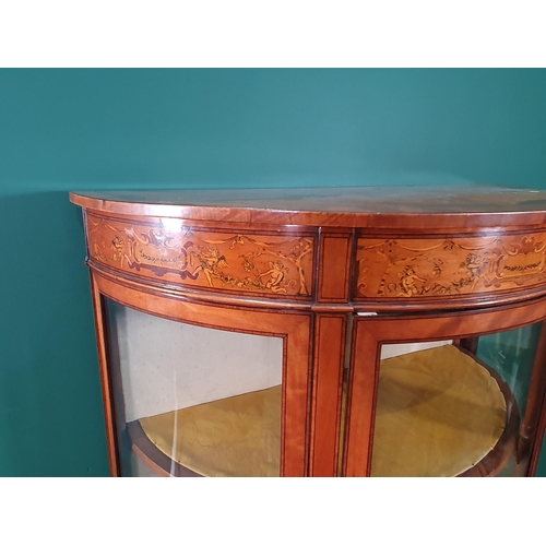 622 - An Edwardian satinwood demi-lune glazed Display Cabinet with fan inlaid top above a classical frieze... 