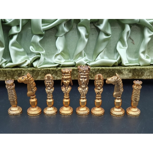 641 - A 1960's Craftsman made Chess Set with white and gilt metal Shakespearian type figures, in plush cov... 